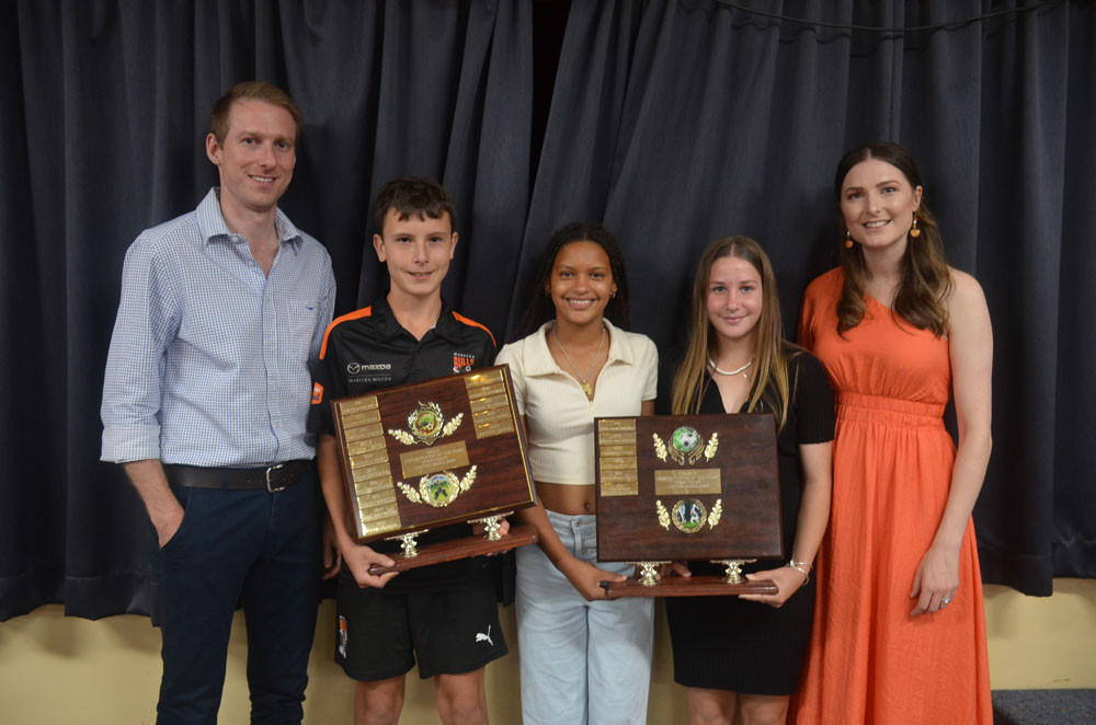 Junior players of the year Xavier Bryde, Madison Buchgraber and Lexi Mukadi with Trophy sponsors Steven Cater and Samantha Madrid from the Cater family.