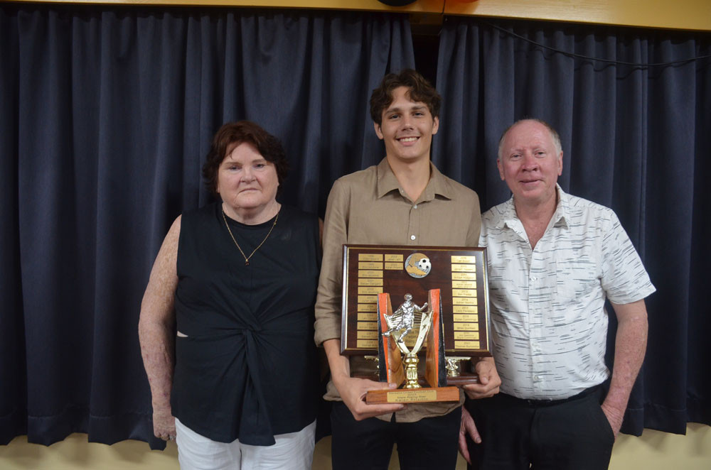 Rising Star Kalen Prizmic with trophy sponsors John and Helene Keal.