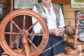 Margaret Pollock on the spinning wheel.