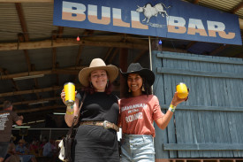Caitlyn Stephens from Malanda and Pinder Singh from Cairns enjoying a drink at the Bull bar.