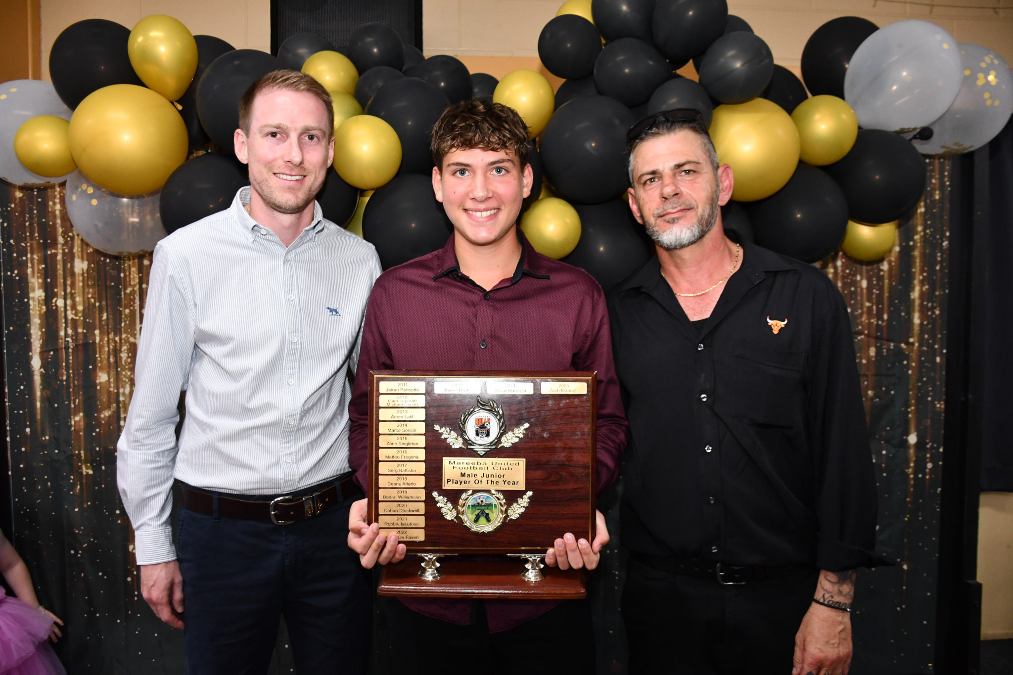 Sponsor Steven Cater with Zach Marinelli and club president Angelo Tatti, who was inducted as a life member.