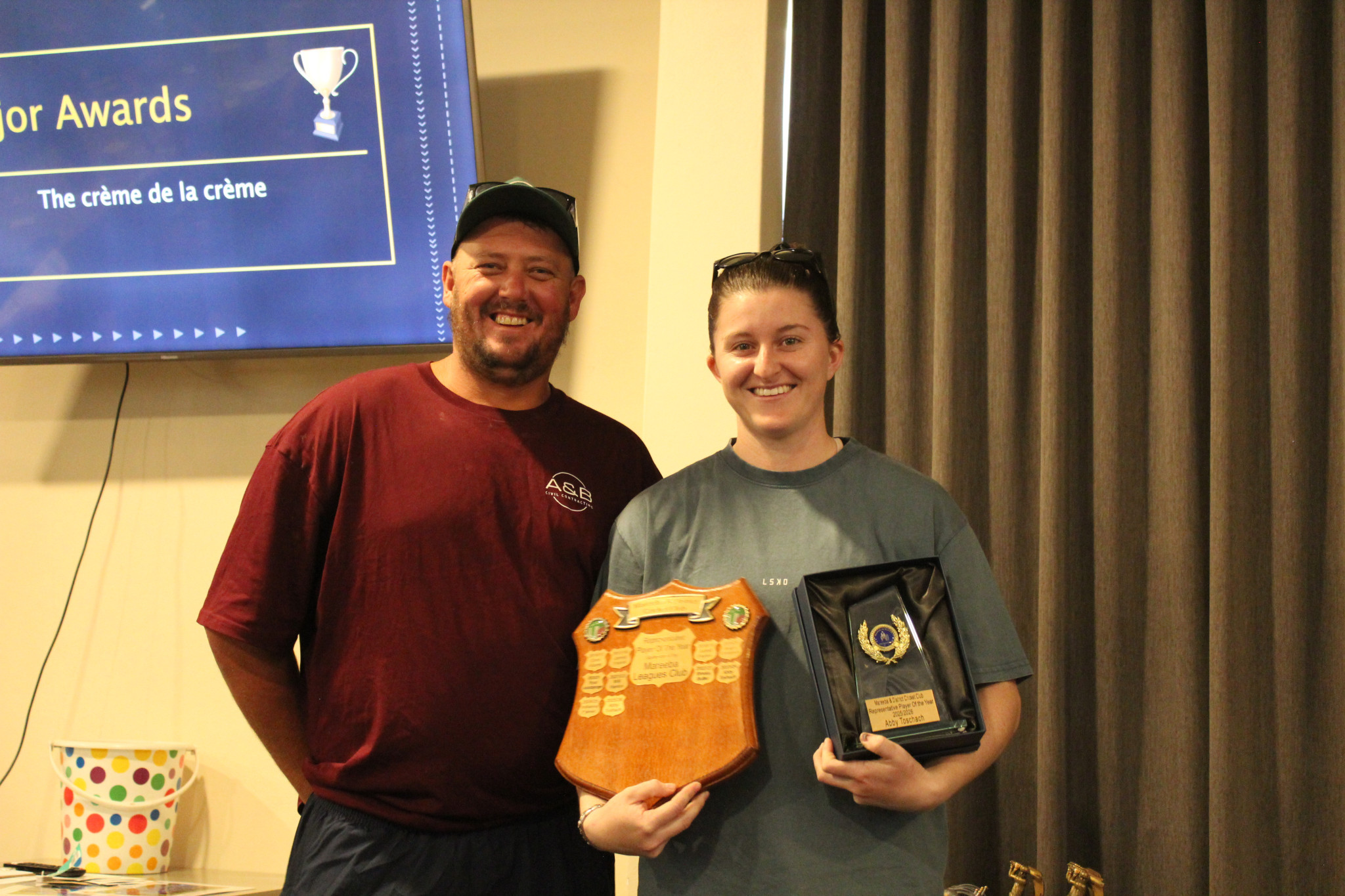Representative Cricketer of the Year Abby Toshach and presenter Adam Parnell.
