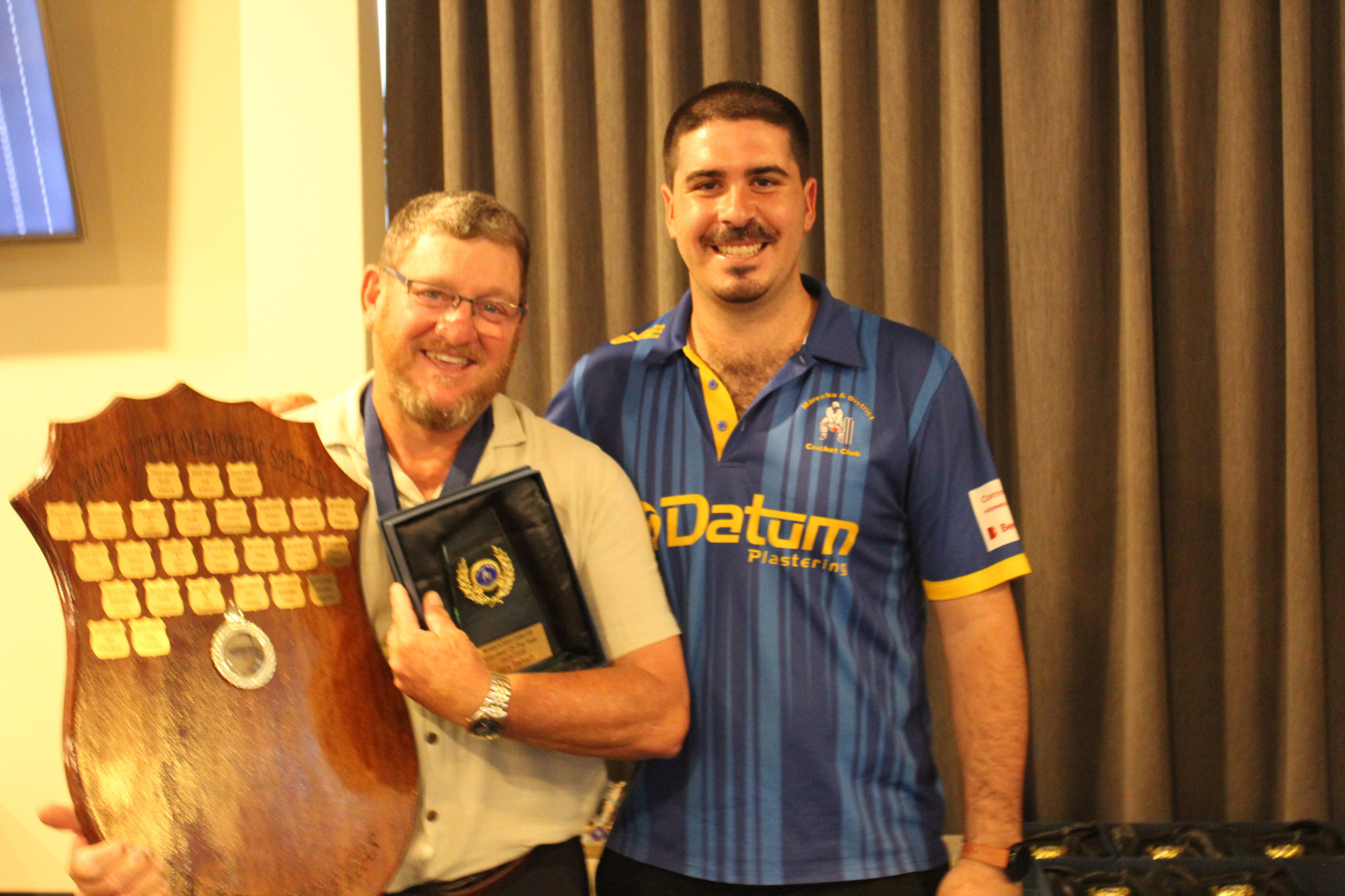Frosty Firth Memorial Award Gary Toshach with first grade captain Brendan Falvo.