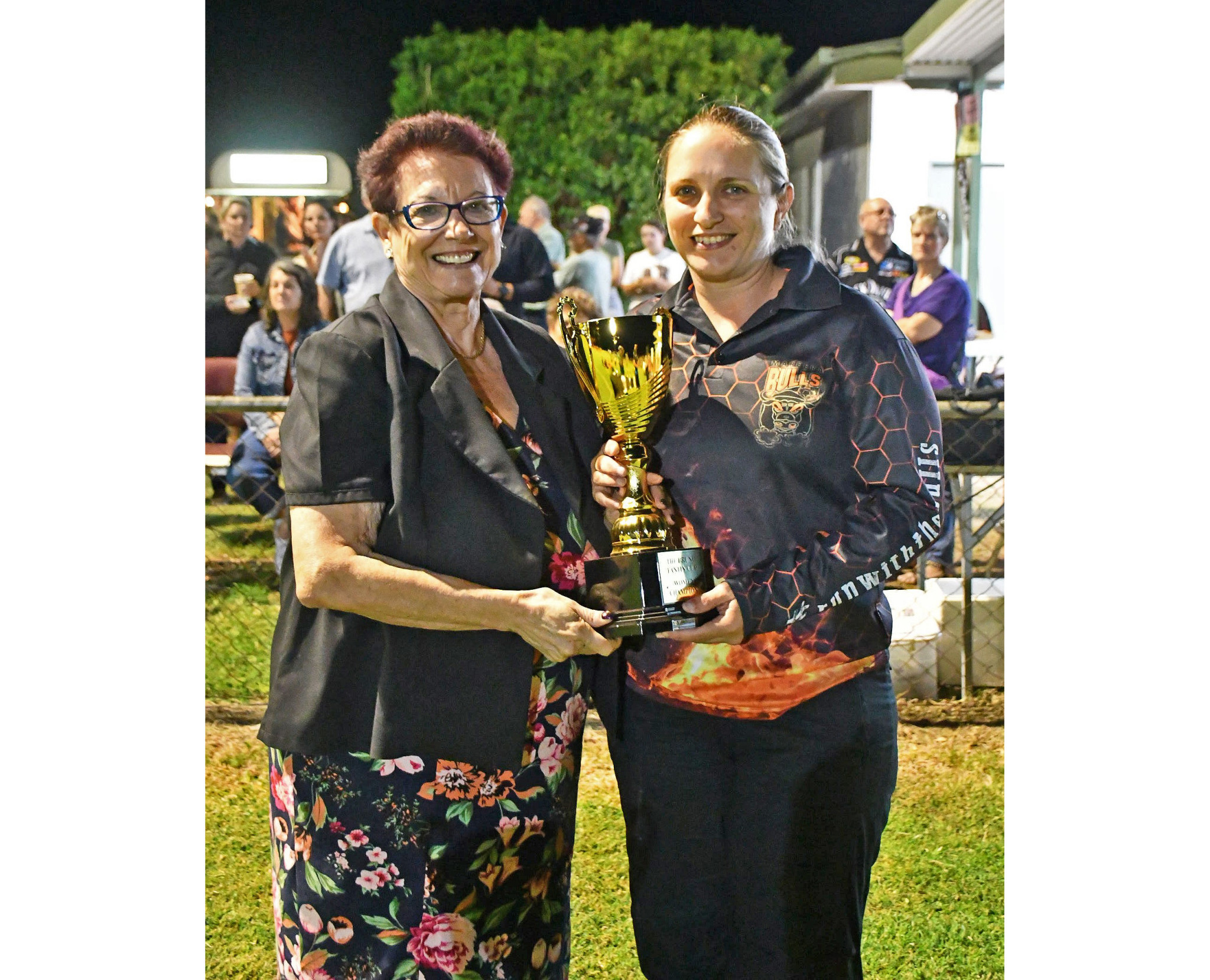 Mareeba Mayor Angela Toppin presents Lady of the Match, Julie Alderton, the winner’s trophy for the inaugural Ladies match.