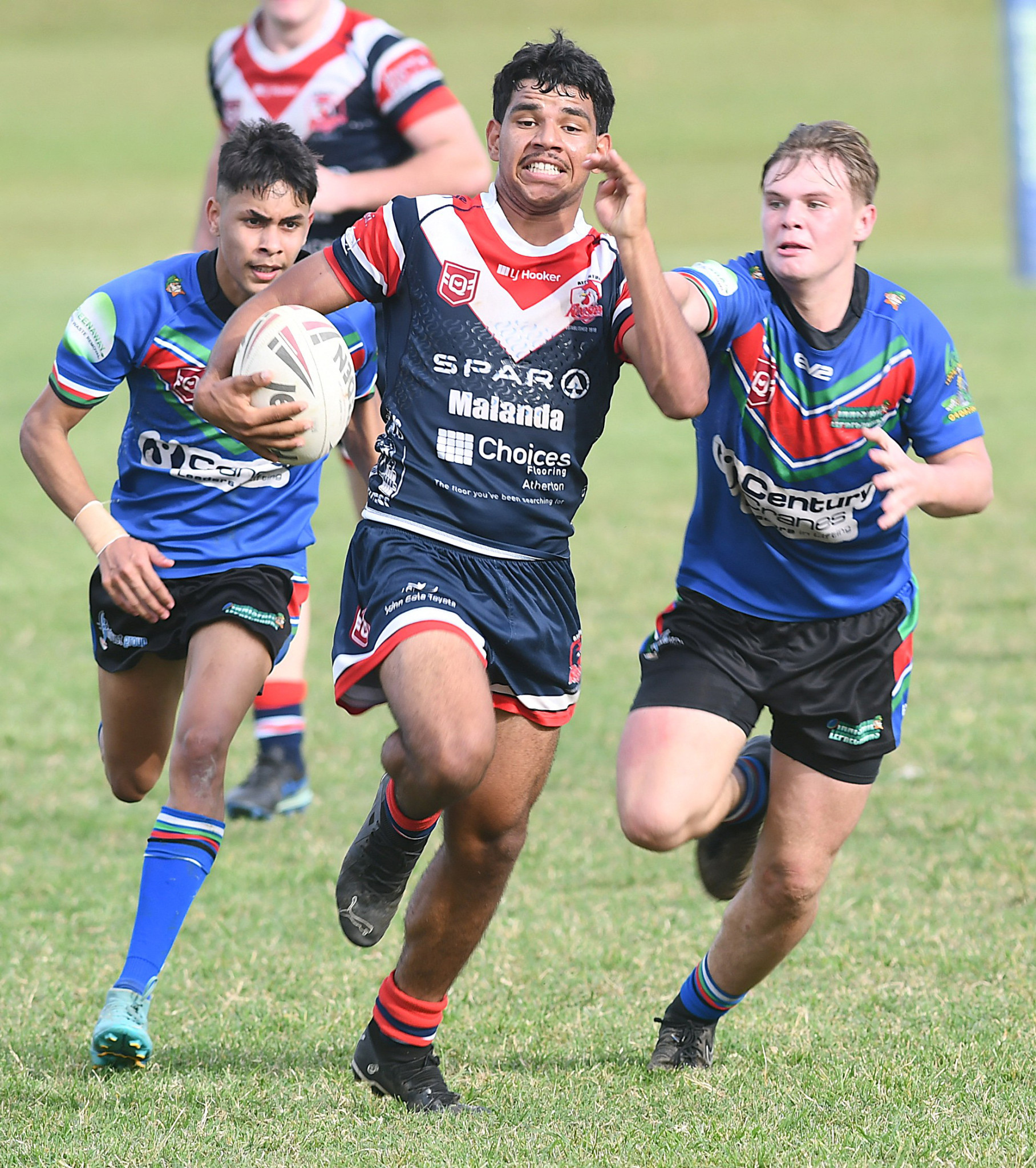 Roosters Under 19s halfback Jamaron Mothe makes a line break in their dominating win against the Innisfail Leprechauns.