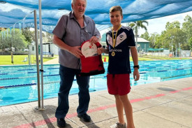 Rocco Carusi receiving his Speedo Swim Star Award.